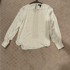 WHBM White Blouse white detail on front and sleeve cuffs. Good condition.